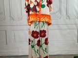 an image of a mannequin dressed in a floral print outfit