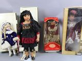 three dolls are sitting next to each other on a table
