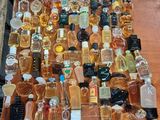 a lot of bottles of alcohol on a table