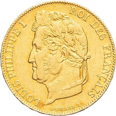 a close up of a gold coin on a white background