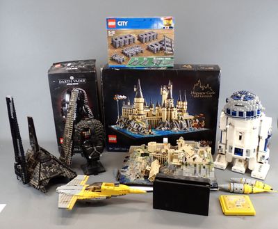 several lego star wars toys are on display on a table