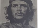 une vieille photo d'un homme portant un chapeau et une barbe