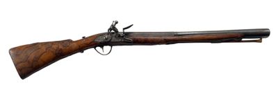 un fusil avec un canon en bois sur fond blanc