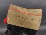 a close up of a military hat on a mannequin head