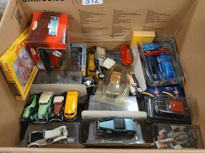 a box full of assorted toy cars in it