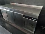 a stainless steel counter in a commercial kitchen