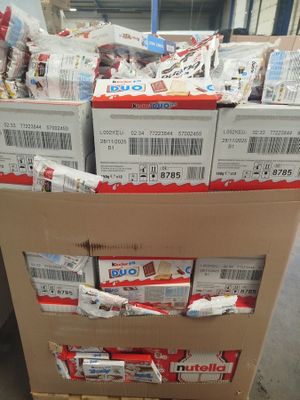 boxes of food are stacked on top of each other in a warehouse