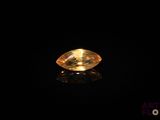 a yellow diamond on a black background