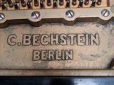 a close up of an old type of piano