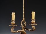 paire de bougeoirs anciens en laiton aux bras torsadés