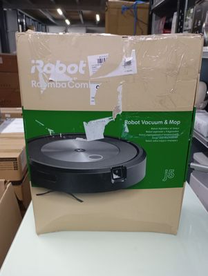 robot vacuum and mop in a box on a table in a store