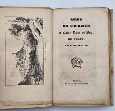 un livre ouvert sur lequel est dessiné un arbre