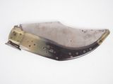 a knife that is laying on top of a table