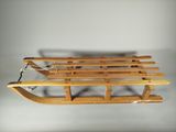 an image of a wooden sled sitting on top of a table