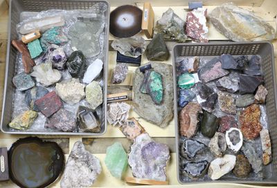 many different types of rocks and stones in this box