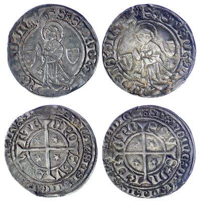 quatre pièces d'argent, dont l'une représente une croix et un homme