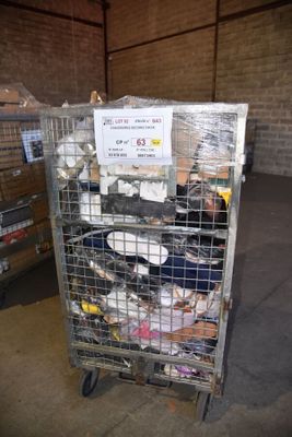 a metal cart with a lot of trash inside of it