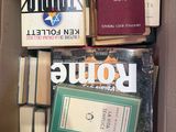 a box full of books that are sitting on a table