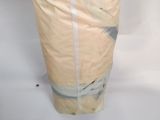a vase that is sitting on a table with a cloth covering it