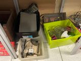 a green box with a phone and a green box with a cell phone in it