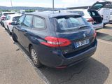many cars parked in a parking lot next to each other