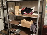 many boxes and boxes on the shelves in the room