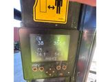 a close up of a parking meter with a sign on it