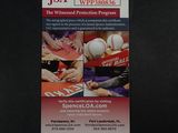 an image of a business card with a picture of a baseball player