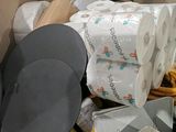 a box full of toilet paper, toilet paper, and other items
