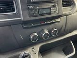 the interior of a car with a steering control and dashboard controls