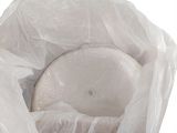 a white object in a plastic bag on a white surface
