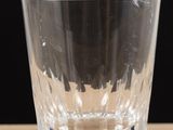 a glass that is sitting on a table