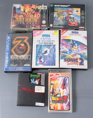 de nombreux jeux vidéo posés les uns à côté des autres sur la table