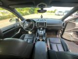 the interior of a car with a dashboard and a steering wheel