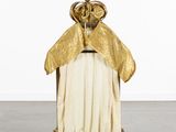an image of a statue of a woman with a crown on top of her head