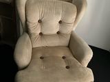 a chair that has buttons on the back of it