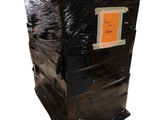 a picture of a black trash can with a sticker on it