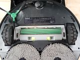 an image of a robot that is connected to a charger