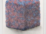 an image of a red, white and blue piece of art