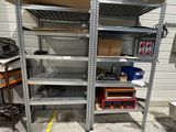 a metal shelving with a lot of items on it