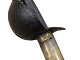 a small black object on top of a metal object