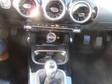 a picture of a car dashboard with a gear box in it