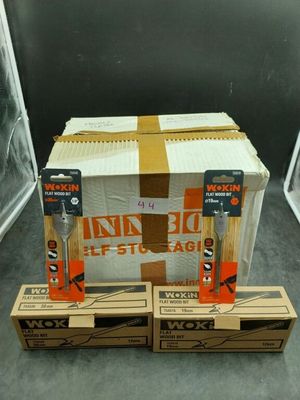 two boxes of toothbrushes sitting on top of each other