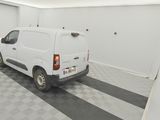 a white van that is parked in a garage