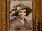 an oil painting of a woman wearing a large hat with lemons on it