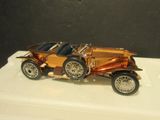 a small model of a car on display on a table
