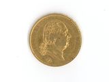 a gold coin with a picture of a man on it