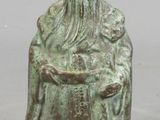 an image of a statue of a man with a cross on his head