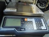 a digital scale sitting on top of a table
