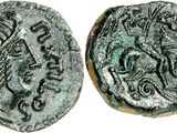 a close up of a coin with an image of a man on it